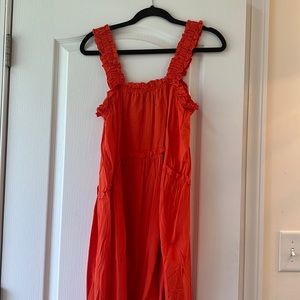 Orange ruffle mini dress